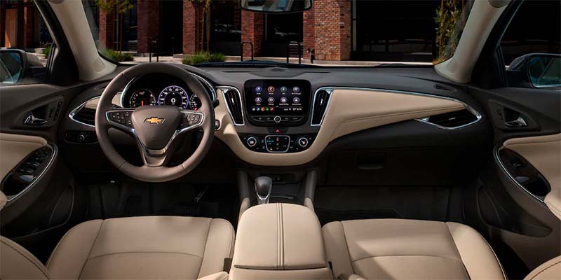 Front-facing view of the Chevrolet Malibu cabin showing the steering wheel